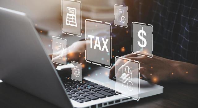 Álava exigirá los Impuestos sobre Determinados Servicios Digitales y sobre las transacciones Financieras. Imagen de portátil para pago de impuestos online