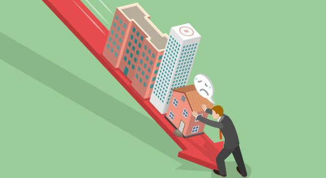 La venta a pérdidas de los inmuebles construidos no acredita que el valor de transmisión del suelo es inferior al de adquisición a efectos del IIVTNU La venta a pérdidas de los inmuebles construidos no acredita que el valor del suelo es inferior en el momento de la transmisión al valor del suelo en el momento de la adquisición a efectos del IIVTNU. Imagen de un dibujo haciendo referencia con una flecha roja y unos edificios encima como si el mercado inmobiliario fuera cayendo