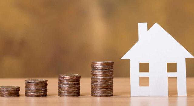 Reserva de capitalización aplicable para entidades patrimoniales Límite en la aplicación de la reserva de capitalización en el IS para una sociedad patrimonial cuyo INCN es inferior al millón de euros. Imagen de la figura de una casa y montoncitos de monedas