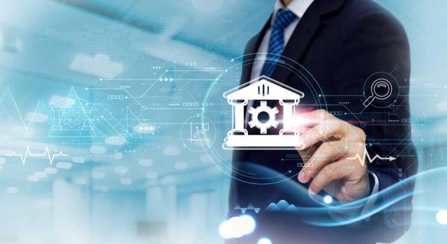 La DGT aplicará el régimen de las actuaciones realizadas a través de medios electrónicos de la AEAT en los procedimientos de aplicación de los tributos y facilitará un modelo de consultas y de representación de carácter no obligatorio. Imagen de la figura de hombre haciendo mención al gobierno electrónico