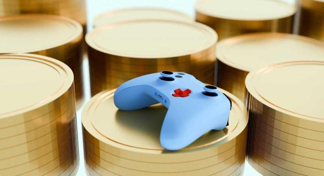 El TJUE establece que la compraventa de unidades de “oro” en videojuegos no constituye bono ni bono polivalente y está sujeta al IVA según el art. 73 de la Directiva del IVA. Imagen del mando de una consola encima de montones de monedas