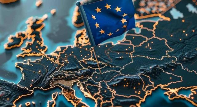 Aplicación del “exit tax” por cambio de residencia a Suiza Traslado de residencia fiscal de España a Suiza y aplicación del «exit tax» del art. 95 bis LIRPF a las participaciones societarias, incluida la posterior donación inter vivos al cónyuge. Imagen del mapa de Europa un una bandera la UE sobre Suiza