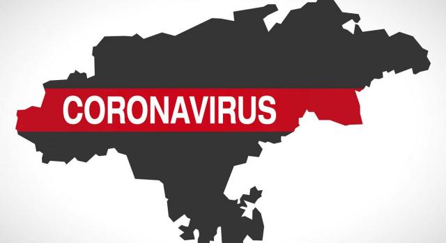 Medidas tributarias en Cantabria. Silueta de Cantabria con la palabra Coronavirus por encima