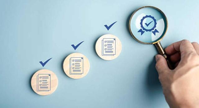 No es posible considerar sujeto infractor del IVA a la entidad dominante respecto a infracciones anteriores a la entrada en vigor de la Ley 11/2021, de medidas de prevención y lucha contra el fraude fiscal. Imagen de un proceso de aprobaciónd e certificados con lupa