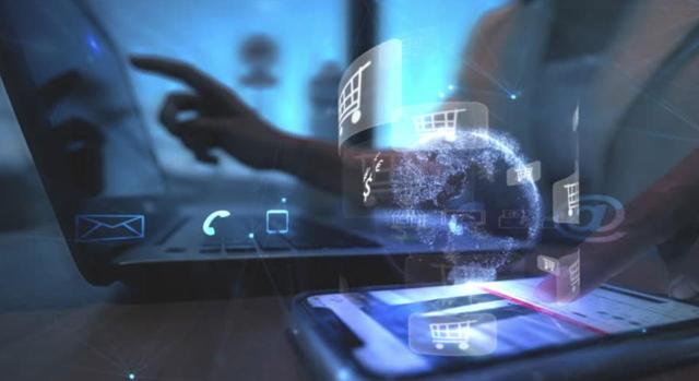 Tasa general de operadores y principio de equivalencia: alcance de la obligación de documentar la realidad de los gastos que genera la actividad administrativa que se sufraga con la tasa. Imagen de un portátil con la silueta de una persona comprando en internet