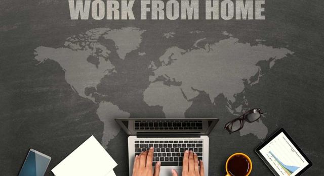 Aplicación del régimen especial de impatriados en el caso de teletrabajar desde España para una empresa situada en el extranjero, aun no teniendo visado de teletrabajo internacional. Imagen del mapa mundi con las letras trabaja desde casa