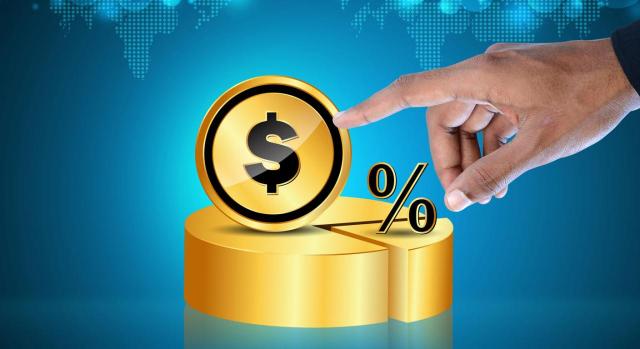 Al emitir la nueva liquidación de la sanción ¿debe concederse al contribuyente el plazo para obtener la reducción por pago? Anulados la liquidación y acuerdo sancionador al emitirse la nueva liquidación de la sanción ¿debe concederse al contribuyente el plazo del art. 62.2 LGT al objeto de obtener la reducción por pago de la sanción prevista en el art.188 LGT? Imagen de una moneda de dolar al lado del símbolo del porcentaje